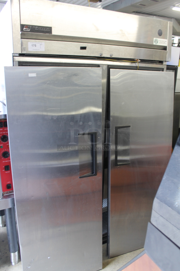 2015 True TG2R-2S Commercial Stainless Steel 2 Door Reach-In Cooler With Polycoated Shelves With Commercial Casters. 115V, 1 Phase. Doors Need To Be Re-Attached. Tested and Powers On But Does Not Get Cold - Image 1 of 8