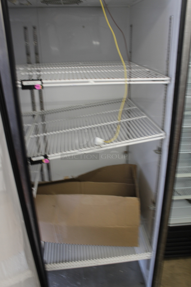 2015 True TG2R-2S Commercial Stainless Steel 2 Door Reach-In Cooler With Polycoated Shelves With Commercial Casters. 115V, 1 Phase. Doors Need To Be Re-Attached. Tested and Powers On But Does Not Get Cold - Image 5 of 8