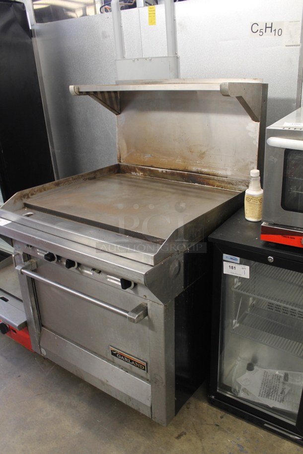 Garland M47R Commercial Stainless Steel Natural Gas Powered Griddle With Oven And Backsplash With Overshelf.  - Image 3 of 9