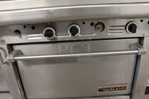 Garland M47R Commercial Stainless Steel Natural Gas Powered Griddle With Oven And Backsplash With Overshelf.  - Image 5 of 9