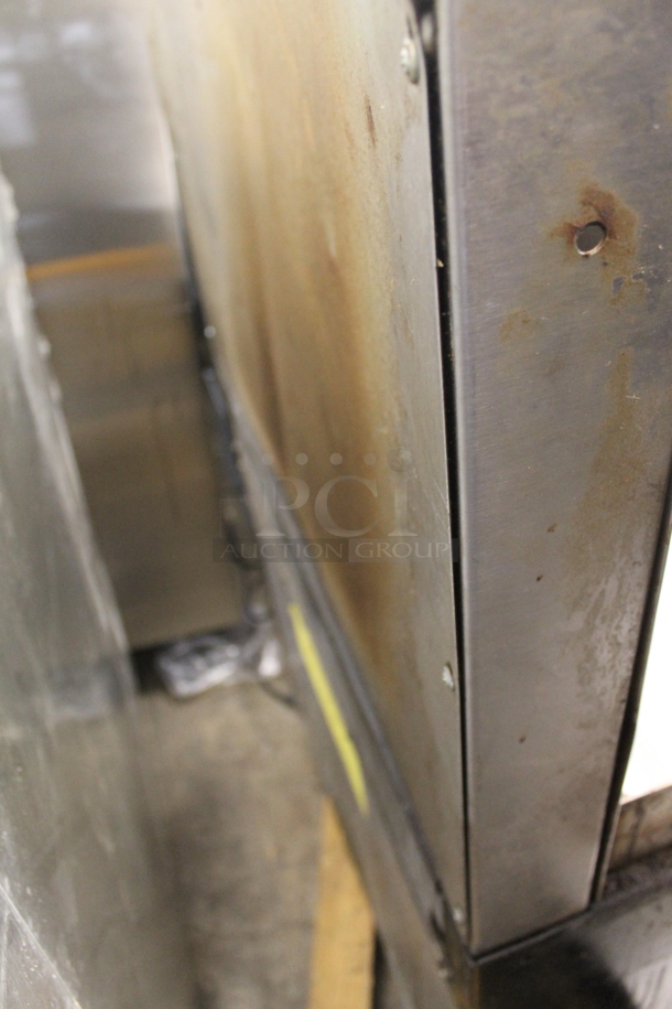 Garland M47R Commercial Stainless Steel Natural Gas Powered Griddle With Oven And Backsplash With Overshelf.  - Image 7 of 9