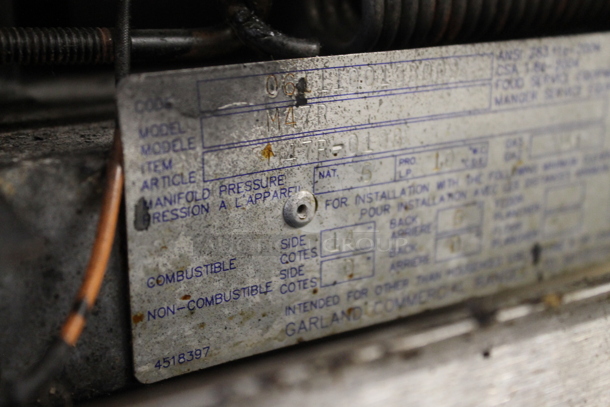 Garland M47R Commercial Stainless Steel Natural Gas Powered Griddle With Oven And Backsplash With Overshelf.  - Image 8 of 9