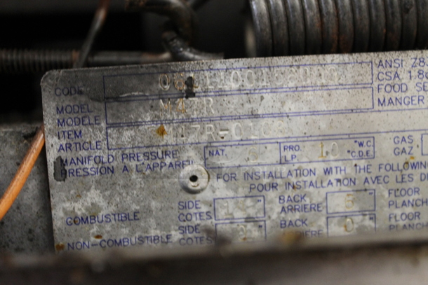 Garland M47R Commercial Stainless Steel Natural Gas Powered Griddle With Oven And Backsplash With Overshelf.  - Image 9 of 9