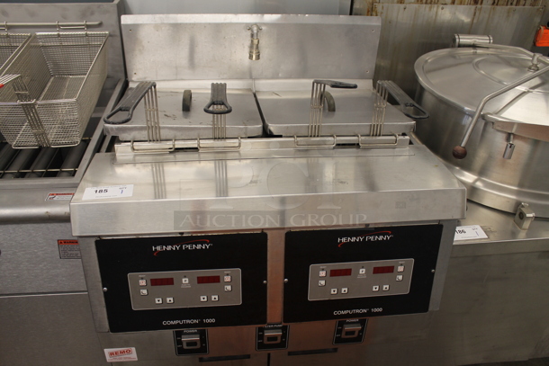 2014 Henny Penny OFG-322 Computron 1000 Commercial Stainless Steel Natural Gas Open Floor Fryer With 2 Wells And 4 Fryer Baskets. 120V, 1 Phase. 170,000 BTU.  - Image 1 of 8