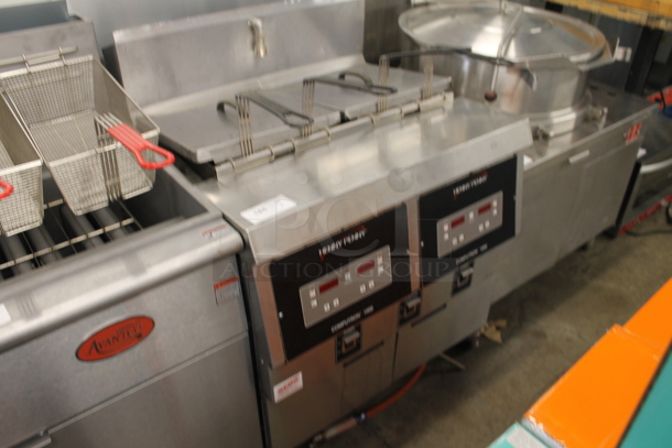2014 Henny Penny OFG-322 Computron 1000 Commercial Stainless Steel Natural Gas Open Floor Fryer With 2 Wells And 4 Fryer Baskets. 120V, 1 Phase. 170,000 BTU.  - Image 3 of 8