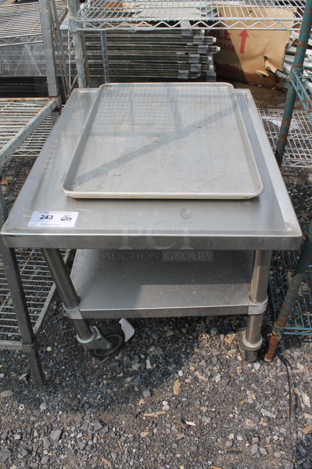 Commercial Stainless Steel Equipment Stand With Undershelf And Aluminum Baking Sheet On Commercial Casters. - Image 1 of 4