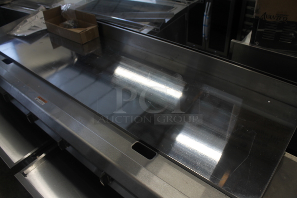 BRAND NEW SCRATCH AND DENT! 2016 CPG 351GTUCPG72N Cooking Performance Group Ultra Series Commercial Stainless Steel Natural Gas Powered 72" Countertop Chrome Top Flat Top Griddle With Thermostatic Controls. 180,000 BTU.  - Image 3 of 11