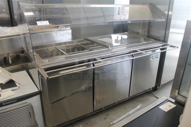 BRAND NEW SCRATCH AND DENT! Avantco 178SSCFT72HC Commercial Stainless Steel Refrigerated Salad Bar/Cold Food Table On Commercial Casters. 115V. Tested and Working!
 - Image 1 of 12