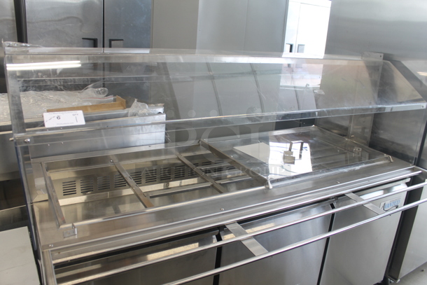 BRAND NEW SCRATCH AND DENT! Avantco 178SSCFT72HC Commercial Stainless Steel Refrigerated Salad Bar/Cold Food Table On Commercial Casters. 115V. Tested and Working!
 - Image 2 of 12