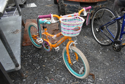 Schwinn Orange, Pink and Blue Metal Childrens Bicycle.