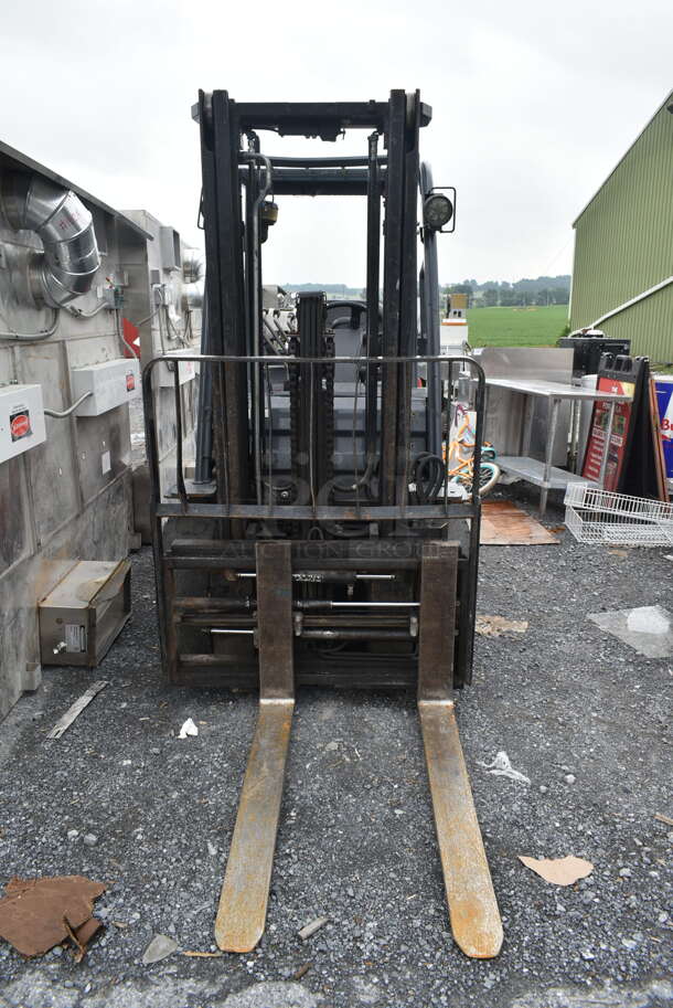 Toyota 8FGU30 Metal Commercial Propane Gas Powered Fork Lift w/ Fork Positioner and Key. 8,771.7 Hours. 5,500 Pound Weight Capacity. Weight 9,915 Pounds. Tires FR: 28x9-15 Solid. Tires RR 6.50x10 Solid. Tilt Hydraulic No Longer Attached. All Other Hydraulics are Functioning. Mast Tilt Requires Repairs. Propane Tank Is Not Included But You Can Use It To Drive The Forklift Onto Your Flatbed For Pick Up. Runs and Drives! - Image 2 of 12
