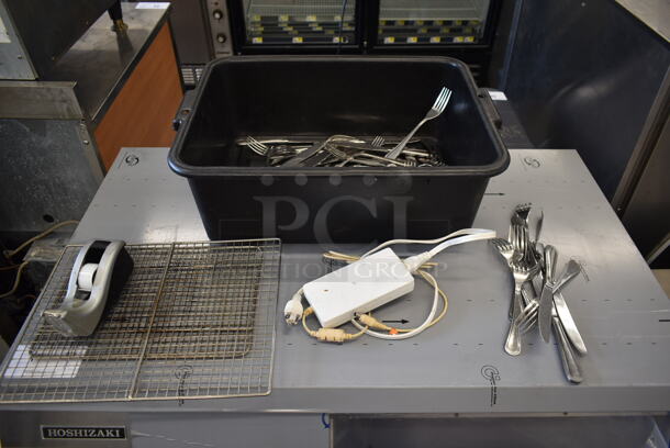 ALL ONE MONEY! Lot of Various Items Including Silverware and Metal Racks in Black Poly Bus Bin! - Image 1 of 7