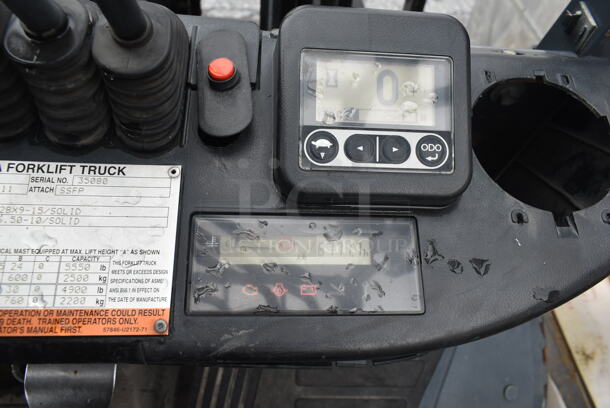 Toyota 8FGU30 Metal Commercial Propane Gas Powered Fork Lift w/ Fork Positioner and Key. 8,771.7 Hours. 5,500 Pound Weight Capacity. Weight 9,915 Pounds. Tires FR: 28x9-15 Solid. Tires RR 6.50x10 Solid. Tilt Hydraulic No Longer Attached. All Other Hydraulics are Functioning. Mast Tilt Requires Repairs. Propane Tank Is Not Included But You Can Use It To Drive The Forklift Onto Your Flatbed For Pick Up. Runs and Drives! - Image 7 of 12