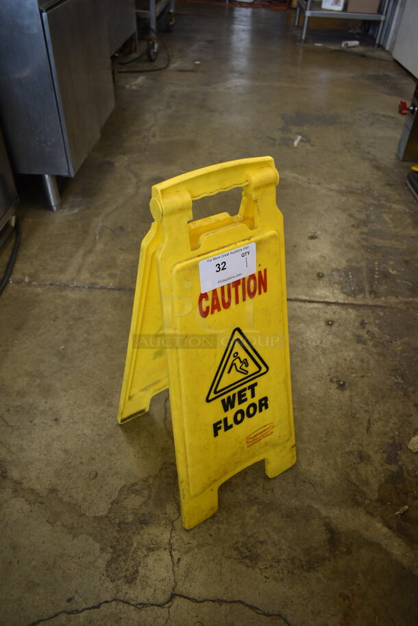 Rubbermaid Yellow Poly Wet Floor Caution Sign. - Image 1 of 3