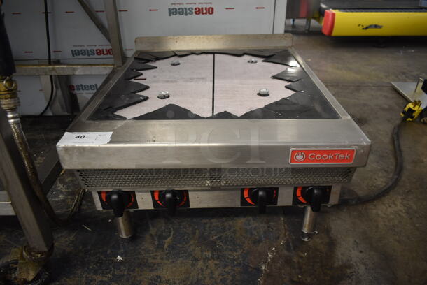 2020 CookTek MC17004-200 Stainless Steel Commercial Countertop Electric Powered 4 Burner Range. 208 Volts. See Pictures For Damaged Range Top. - Image 1 of 6