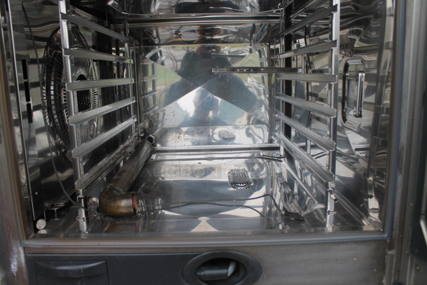 2 2016 Rational Stainless Steel Commercial Combitherm Self Cooking Center Convection Ovens. comes w/ Commercial Casters. Top Model: SCC WE 62. Bottom Model: SCC WE 102. 480 Volts, 3 Phase. 2 Times Your Bid!
 - Image 3 of 8