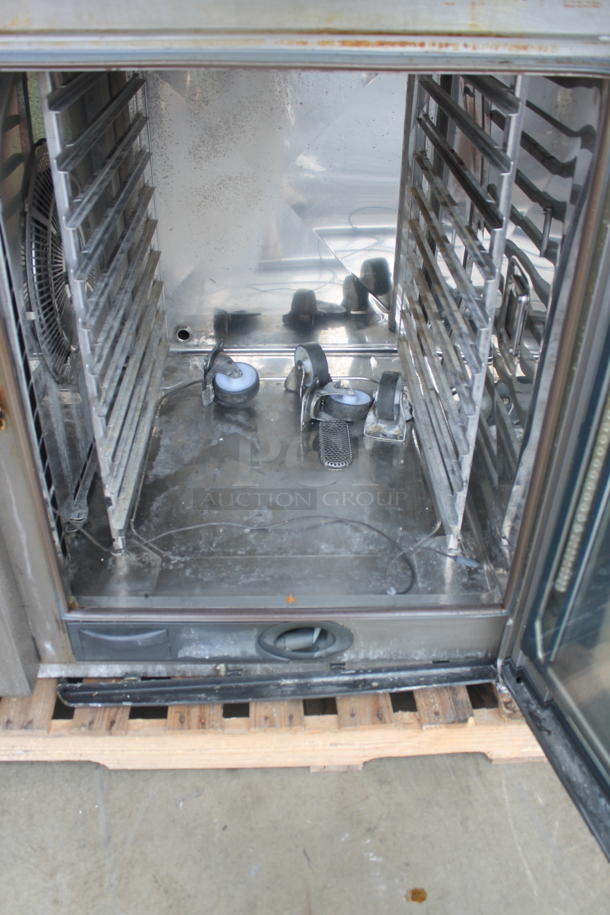 2 2016 Rational Stainless Steel Commercial Combitherm Self Cooking Center Convection Ovens. comes w/ Commercial Casters. Top Model: SCC WE 62. Bottom Model: SCC WE 102. 480 Volts, 3 Phase. 2 Times Your Bid!
 - Image 5 of 8