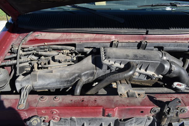 1992 Ford Ecoline E-150 Chateau Club Wagon Multipurpose Passenger Van w/ Hitch and Spare Tire. Odometer Reads 134,008. VIN 1FMEE11N6PHA00518. Title In Hand. Vehicle Runs and Drives But Battery Is Dead So It Will Need To Be Jumped. See Lot 2 For Additional Pictures. - Image 12 of 12