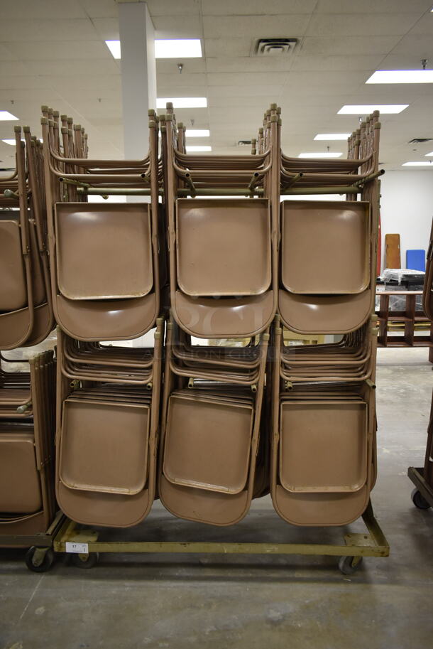 Metal Folding Chair Cart on Commercial Casters w/ Approximately 60 Brown Metal Folding Chairs. (Main Building) - Image 1 of 3