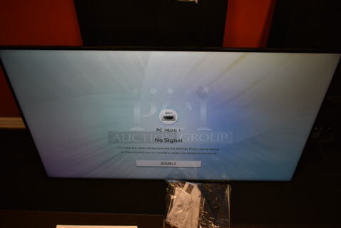 Samsung UN65NU6900 65" Television. 110-120 Volts, 1 Phase. Buyer Must Pick Up - We Will Not Ship This Item. Tested and Working!