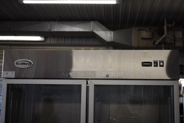 BRAND NEW SCRATCH AND DENT! 2023 KoolMore RIR-2D-GD Stainless Steel Commercial 2 Door Reach In Cooler Merchandiser w/ Poly Coated Racks on Commercial Casters. 115 Volts, 1 Phase. Tested and Working! - Image 2 of 9