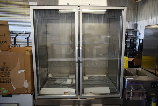 BRAND NEW SCRATCH AND DENT! 2023 KoolMore RIR-2D-GD Stainless Steel Commercial 2 Door Reach In Cooler Merchandiser w/ Poly Coated Racks on Commercial Casters. 115 Volts, 1 Phase. Tested and Working! - Image 3 of 9