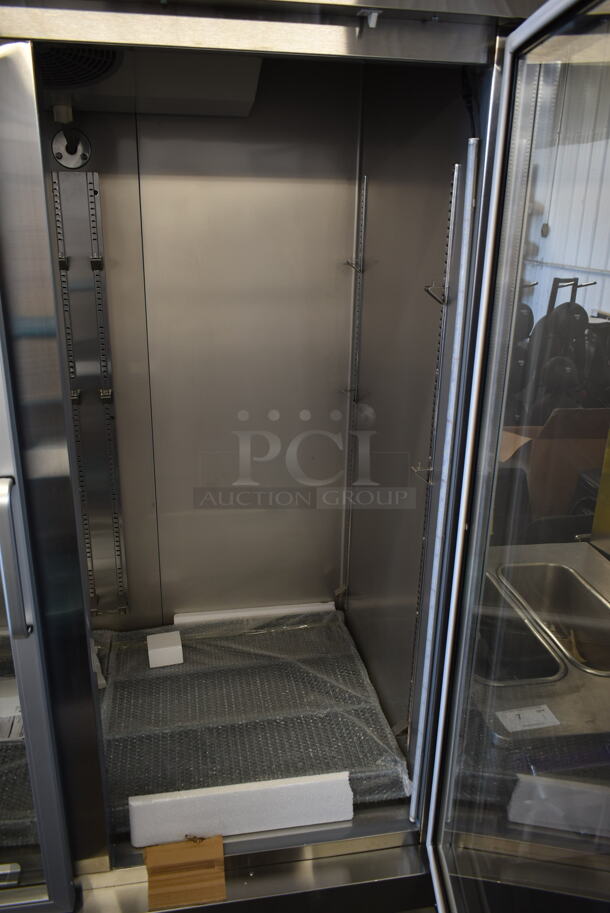 BRAND NEW SCRATCH AND DENT! 2023 KoolMore RIR-2D-GD Stainless Steel Commercial 2 Door Reach In Cooler Merchandiser w/ Poly Coated Racks on Commercial Casters. 115 Volts, 1 Phase. Tested and Working! - Image 8 of 9