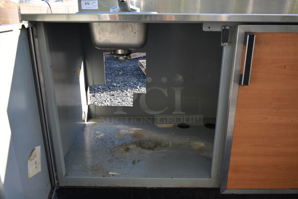 Duke Stainless Steel Commercial Counter w/ Sink Bay, Faucet, Handle, Back Splash and 2 Wood Pattern Doors. - Image 6 of 7
