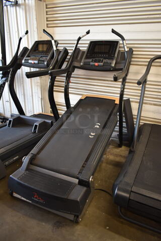 Freemotion FMTK74810.7 i11.9 Incline Trainer Metal Commercial Floor Style Treadmill. 110-120 Volts, 1 Phase. Tested and Powers On But Parts Do Not Move