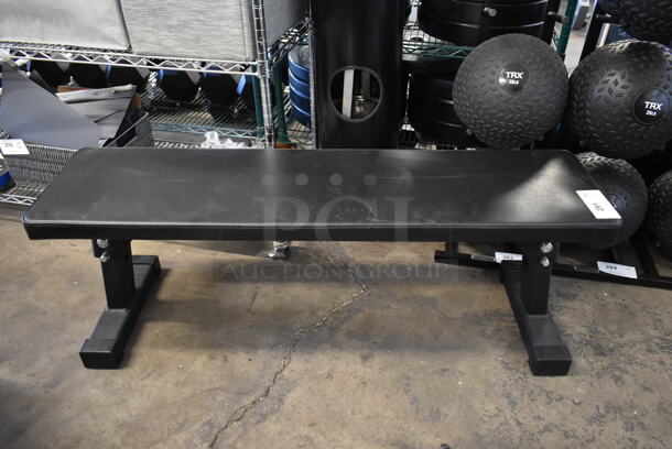 Rogue Metal Black Flat Workout Bench. Stock Picture - Cosmetic Condition May Vary. - Image 1 of 5