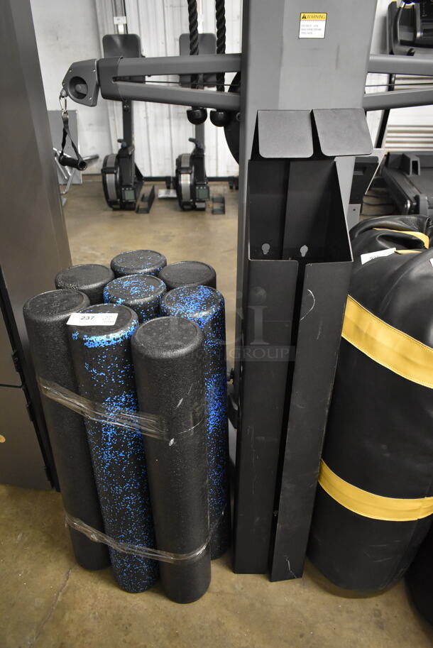 8 Foam Body Rollers and Rogue Wall Mount Foam Roller Holder. 8 Times Your Bid! - Image 1 of 8