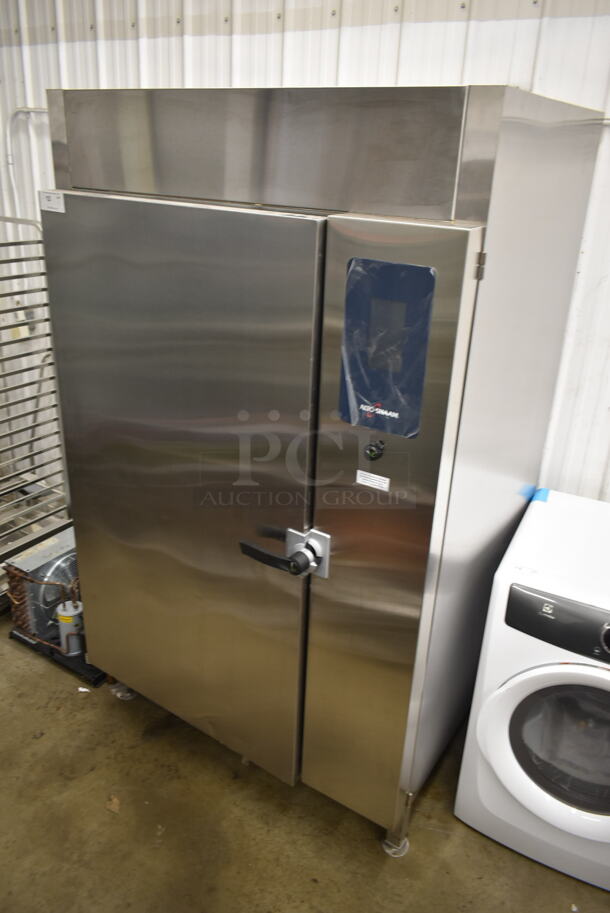 BRAND NEW! 2019 Alto Shaam QC3-100R Stainless Steel Commercial Floor Style Blast Chiller w/ 3 Probes. Comes w/ Remote RivaCold Compressor and Metal Pan Transport Rack. 115/208-230 Volts, 1 Phase. Stock Picture Used as Gallery Picture - Image 3 of 12