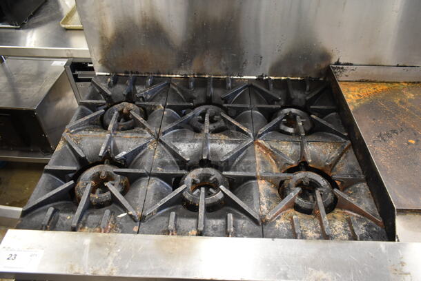 Garland X60-6G24RR Stainless Steel Commercial Natural Gas Powered 6 Burner Range w/ Flat Top Griddle, 2 Ovens, Over Shelf and Back Splash.  - Image 2 of 10