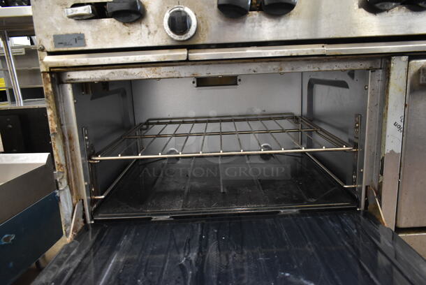 Garland X60-6G24RR Stainless Steel Commercial Natural Gas Powered 6 Burner Range w/ Flat Top Griddle, 2 Ovens, Over Shelf and Back Splash.  - Image 6 of 10