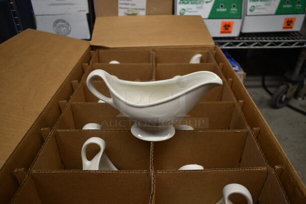 2 Boxes of 12 BRAND NEW! White Ceramic Gravy Boats. 2 Times Your Bid! - Image 1 of 4
