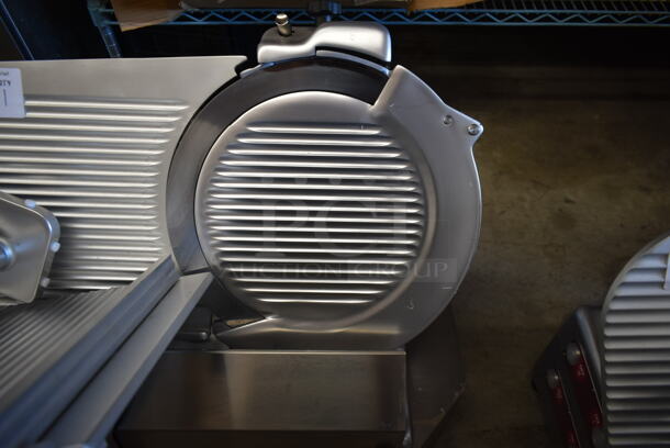 BRAND NEW SCRATCH AND DENT! Estella 348SLAS13 Stainless Steel Commercial Countertop Automatic Meat Slicer w/ Blade Sharpener. 120 Volts, 1 Phase. Tested and Powers On But Parts Do Not Move - Image 2 of 7