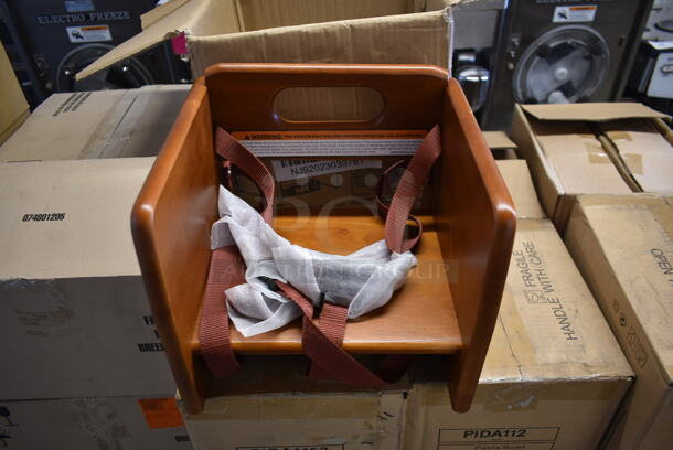 BRAND NEW! Winco Wood Pattern Booster Seat. - Image 1 of 6