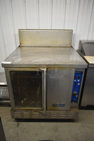 Imperial Stainless Steel Commercial Gas Powered Full Size Convection Oven w/ View Through Door, Solid Door and Metal Racks on Commercial Casters.