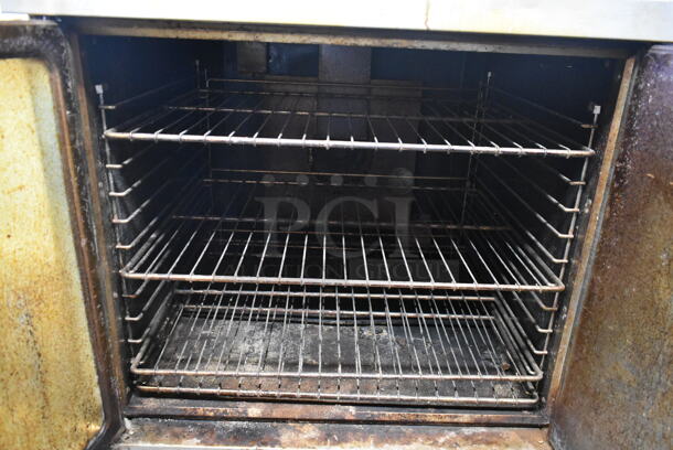 Imperial Stainless Steel Commercial Gas Powered Full Size Convection Oven w/ View Through Door, Solid Door and Metal Racks on Commercial Casters. - Image 6 of 7