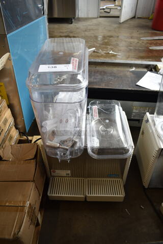 BRAND NEW SCRATCH AND DENT! Crathco Stainless Steel Commercial Countertop 2 Hopper Refrigerated Beverage Machine. Missing 1 Hopper. 115 Volts, 1 Phase. Tested and Working!