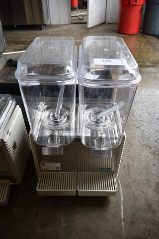 BRAND NEW SCRATCH AND DENT! Crathco Stainless Steel Commercial Countertop 2 Hopper Refrigerated Beverage Machine. 115 Volts, 1 Phase. Tested and Working!