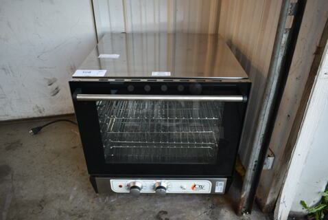 BRAND NEW SCRATCH AND DENT! Cooking Performance Group CPG 351COHT4M Stainless Steel Commercial Countertop Electric Powered Half Size Convection Oven. 208-240 Volts, 1 Phase. Tested and Working!