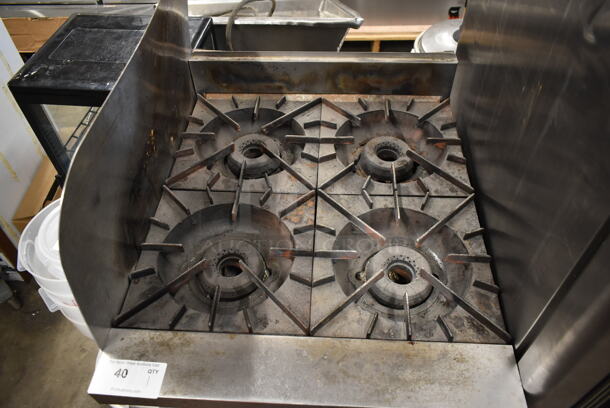 Vulcan Stainless Steel Commercial Countertop Natural Gas Powered 4 Burner Range w/ Left Side Splash Guard on Regency 600ES2424S Stainless Steel Equipment Stand w/ Under Shelf. - Image 2 of 7