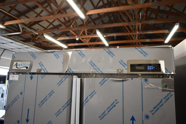 BRAND NEW SCRATCH AND DENT! 2023 Avantco 447AP49F Stainless Steel Commercial 2 Door Reach In Freezer w/ Poly Coated Racks . 115 Volts, 1 Phase. Tested and Working! - Image 2 of 9