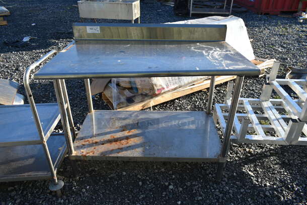 Stainless Steel Commercial Table w/ Back Splash and Under Shelf. - Image 1 of 4