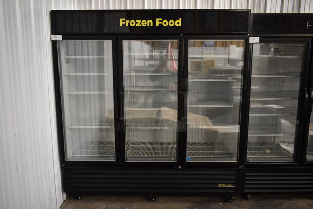 2012 True GDM-72F-LD ENERGY STAR Metal Commercial 3 Door Reach In Freezer Merchandiser w/ Poly Coated Racks on Commercial Casters. 115/208-230 Volts, 1 Phase. - Image 1 of 8