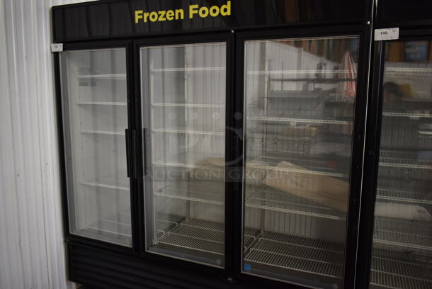 2012 True GDM-72F-LD ENERGY STAR Metal Commercial 3 Door Reach In Freezer Merchandiser w/ Poly Coated Racks on Commercial Casters. 115/208-230 Volts, 1 Phase. - Image 3 of 8
