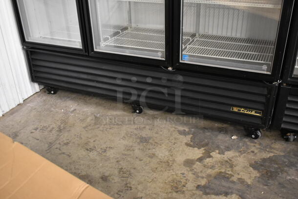 2012 True GDM-72F-LD ENERGY STAR Metal Commercial 3 Door Reach In Freezer Merchandiser w/ Poly Coated Racks on Commercial Casters. 115/208-230 Volts, 1 Phase. - Image 4 of 8