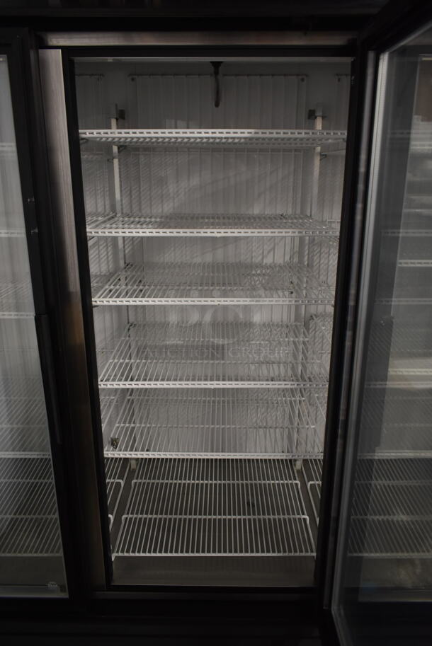 2012 True GDM-72F-LD ENERGY STAR Metal Commercial 3 Door Reach In Freezer Merchandiser w/ Poly Coated Racks on Commercial Casters. 115/208-230 Volts, 1 Phase. - Image 7 of 8