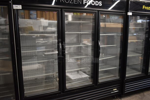 2016 True GDM-72F-HC-TSL01 ENERGY STAR Metal Commercial 3 Door Reach In Freezer Merchandiser w/ Poly Coated Racks on Commercial Casters. 115/208-230 Volts, 1 Phase. - Image 3 of 9